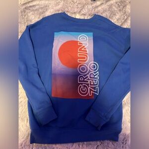 Bella Canvas Blue Graphic Sweatshirt with Red Sun Design